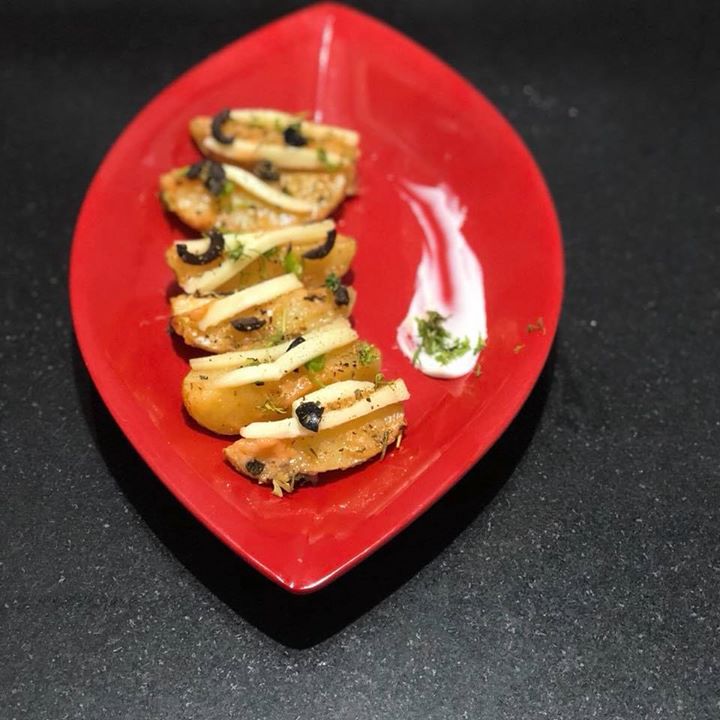Baked potato wedges with olives.
When enjoyed in moderation and prepared in a healthy way, potatoes can be a nutritious addition to your diet.
Potatoes contain resistant starch, which may improve digestive health, nutrient absorption and satiety. 
Keeping the peel on the potato, selecting nutritious toppings and choosing to boil, steam or bake your potatoes can make them healthier.
Ultimately, portion size and cooking methods have a major influence on the health effects of potatoes.
#potatoes #healthyrecipes #bakedpotatoes #resistancestarch #digestivehealth #potatowedges