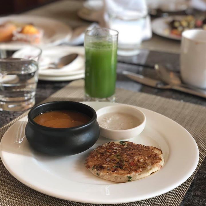 #breakfast 
South Indian breakfast is a complete meal with good carbs, protein and good fats from coconut.
Tried to balance it with cucumber juice 
And not to forget the portion size 
I have big bowl of dal and small portion of uttapam. 
#breakfast #southindian #vegetablejuice #uttapam #healthybreakfast