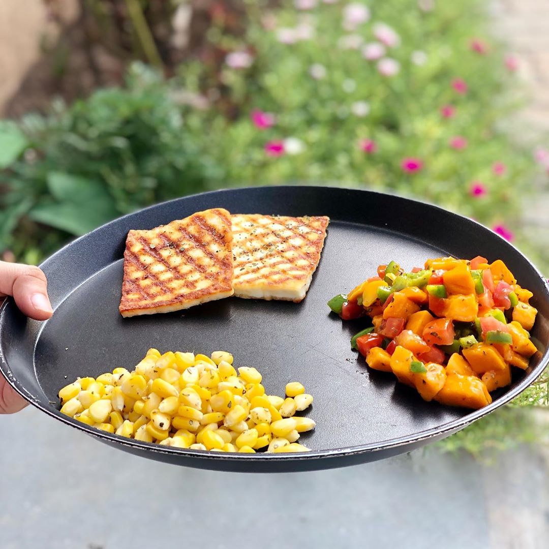 Sunday lunch plate 
#kpmeals 
Grilled paneer 
Mango salasa ( mango + capsicum + tomato ) - last few days to enjoy favourite fruit 
Boiled masala corn 
Some fancy lunch with not much of cooking today.
All chopping mixing and just grilling and that’s done for lazy Sunday meals.
#healthyeating #balancedmeal #komalpatel #kpmeals #kplunch #grilledpaneer #mangosalsa