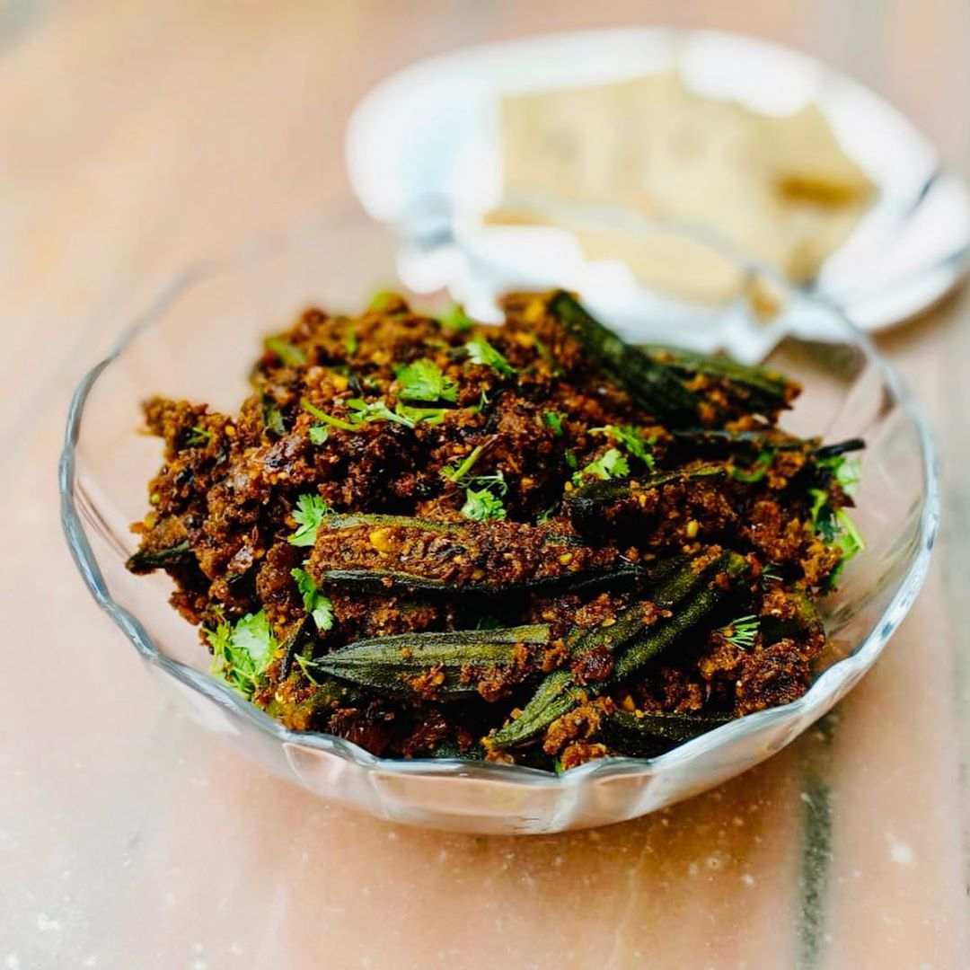 Who doesn't love Bhindi(Okra)?!! 
An upgrade to our tiffin friendly, boring and simple Bhindi !!! - OVEN BAKED STUFFED OKRA!!!.
.
.
Crispy, scrumptious, rustic and most importantly HEALTHY!