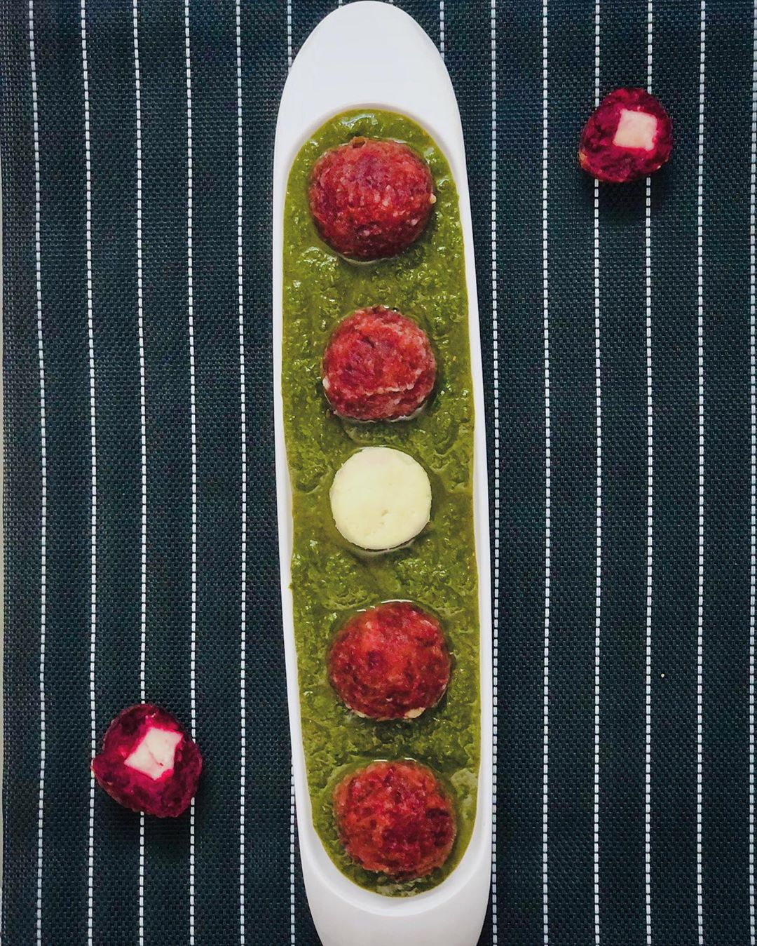 Palak Paneer and Malia Kofta are the two classics of every Indian house. But what would happen if you combine the two??.................. 
So here is Palak Paneer with beetroot Kofta!! 
Filled with the goodness of (sailor man) Popeye's favorite 
